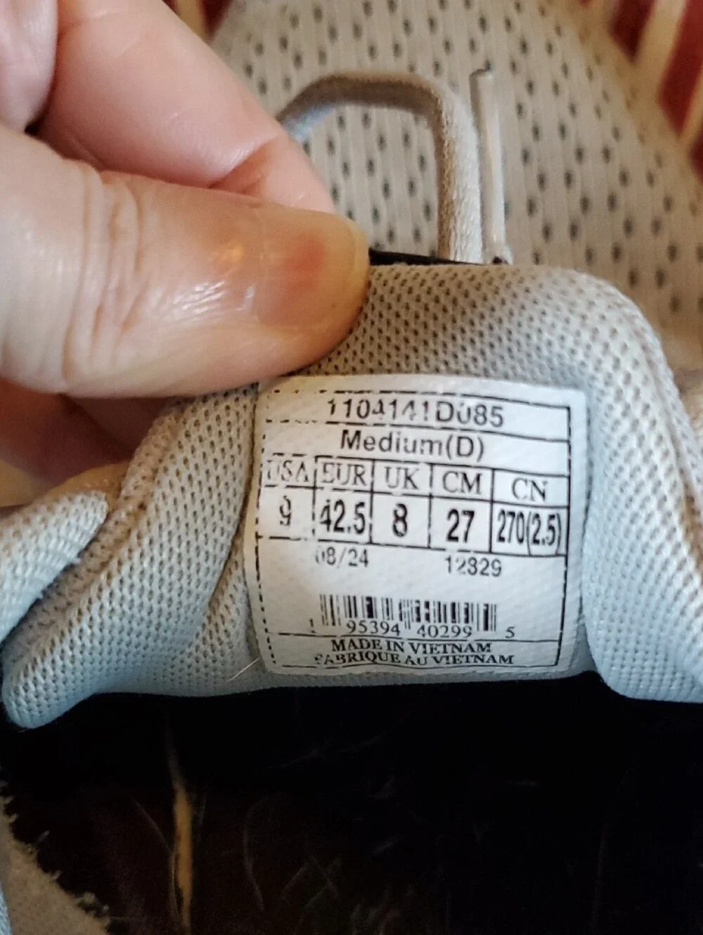 Brooks beige and white running shoes